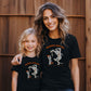 mom and daughter matching halloween mummy and me shirts featuring a mummy and a little mummy with a bow in her hair